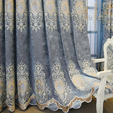 Blue velvet curtain with gold embroidered baroque pattern, elegant scalloped edges