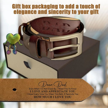 Brown leather belt with metallic buckle, engraved message for dad, presented in a gift box.