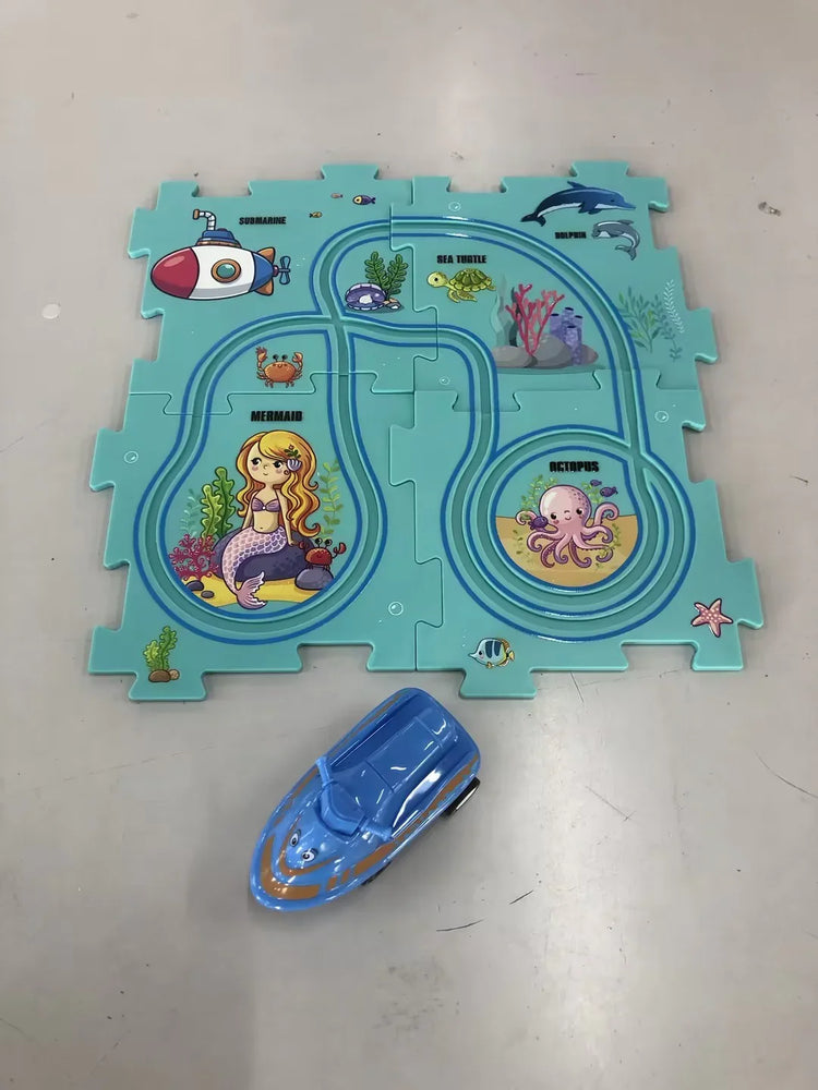 Colorful undersea-themed puzzle mat with cartoon mermaid, sea animals, and a blue toy boat.