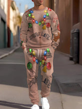 Man wearing a beige Christmas-themed streetwear tracksuit with colorful holiday light prints, festive graphics, and relaxed fit.