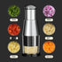 Stainless steel manual food chopper with chopped onion, garlic, carrot, ginger, and chili display.