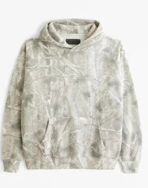 Beige camouflage print hoodie with relaxed fit and front kangaroo pocket