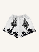 White streetwear shorts with black baroque portrait and floral rose patterns, relaxed fit