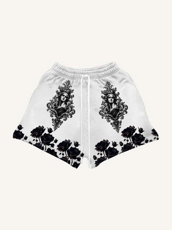 White streetwear shorts with black baroque portrait and floral rose patterns, relaxed fit