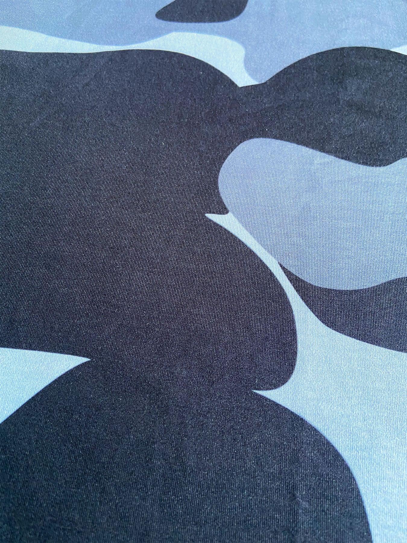 Blue and black camouflage streetwear fabric, soft cotton material, close-up texture