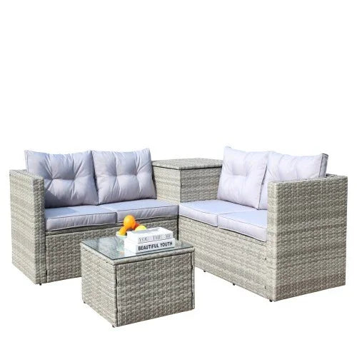Light gray rattan outdoor sectional sofa set with cushion seating and glass top coffee table