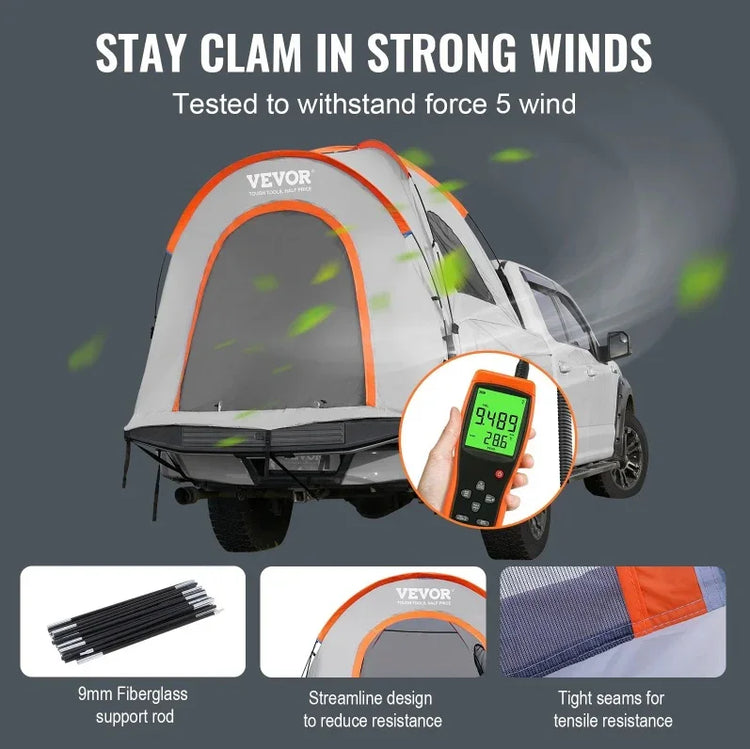 Gray and orange truck tent with streamlined design, fiberglass poles, tight seams, fits car bed