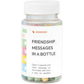 Clear plastic jar with white twist lid, filled with pastel paper capsules, labeled &
