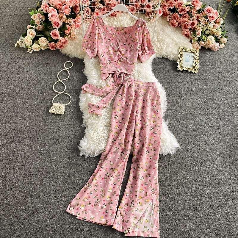 Pink floral two-piece set with tie waist top and wide-leg pants, soft fabric, feminine fit