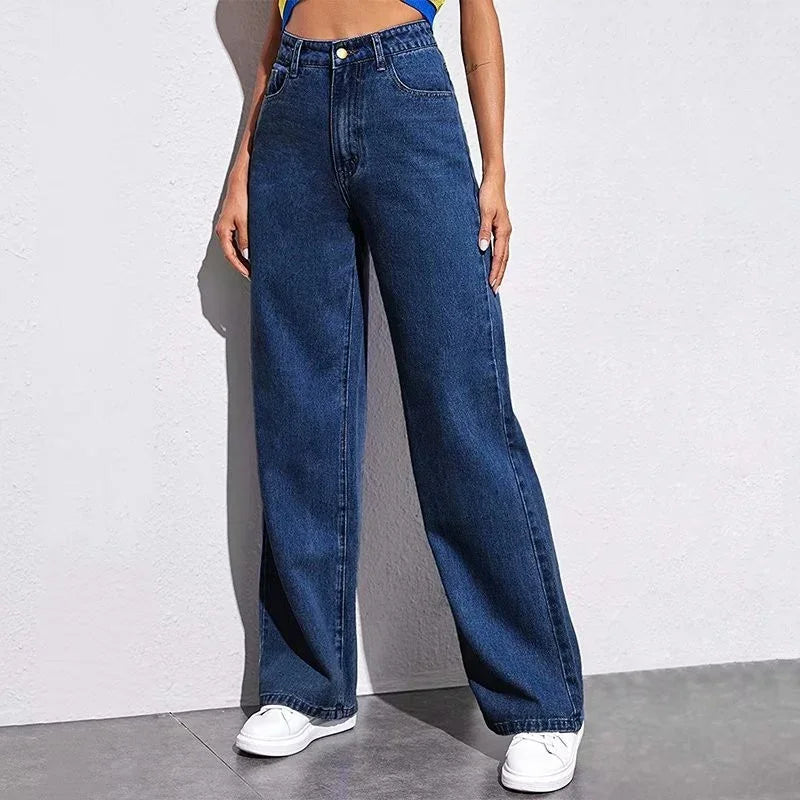 Woman wearing high-waisted wide leg dark blue denim jeans with relaxed fit