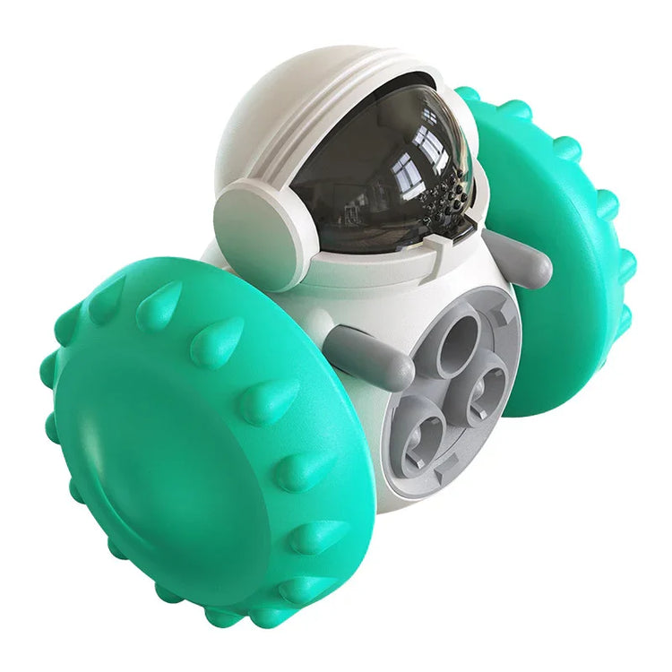 Futuristic white and teal toy robot with spiked rubber wheels and a dark visor helmet