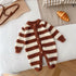 Brown and white striped fuzzy baby romper with button front, cozy and soft material