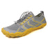 Lightweight grey and yellow athletic sneaker with mesh upper and easy-pull elastic laces