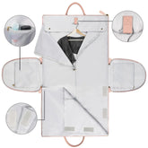 Light gray garment bag with pink trim, multiple zip pockets, and secure Velcro closures