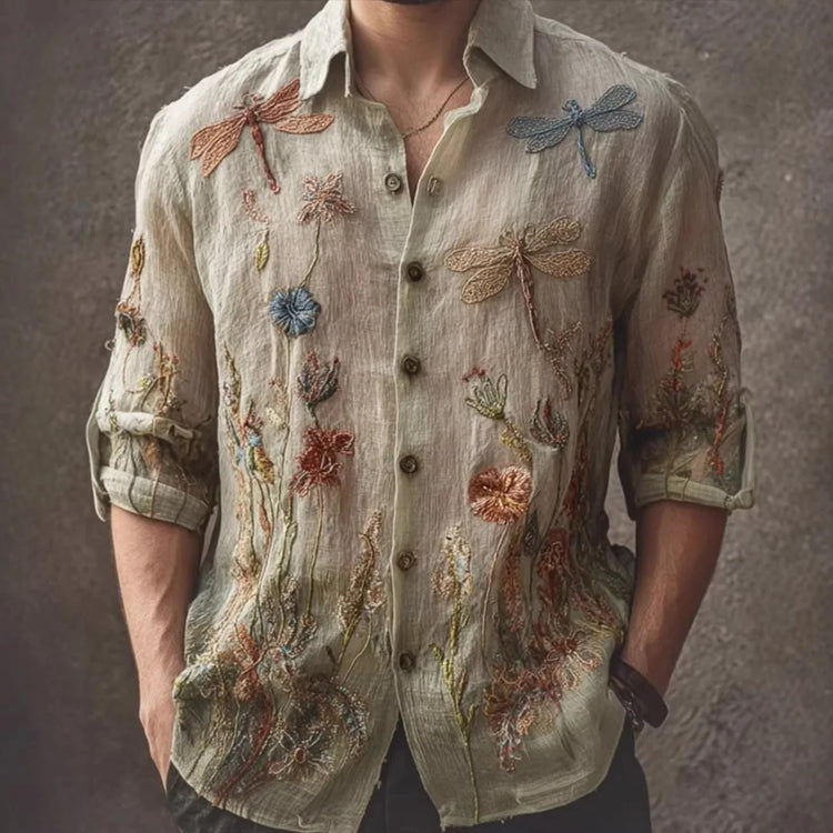Beige linen button-up shirt with embroidered dragonflies and floral patterns, relaxed fit.