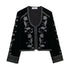 Black velvet jacket with silver floral embroidery, long sleeves, and relaxed fit.