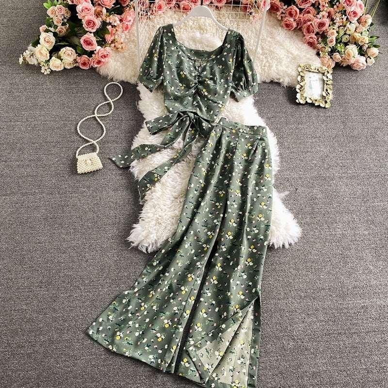 Green floral two-piece set with short-sleeve crop top and wide-leg pants, lightweight fabric