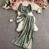 Green floral two-piece set with short-sleeve crop top and wide-leg pants, lightweight fabric