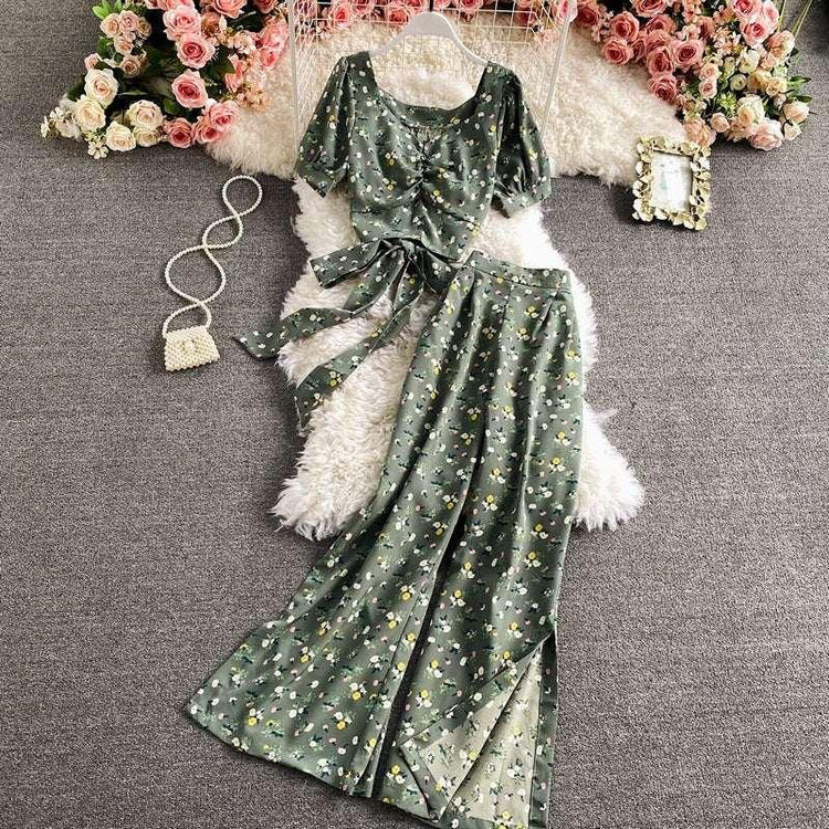 Green floral two-piece set with short-sleeve crop top and wide-leg pants, lightweight fabric
