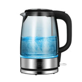 Electric glass kettle with black handle and stainless steel base, water boiling inside