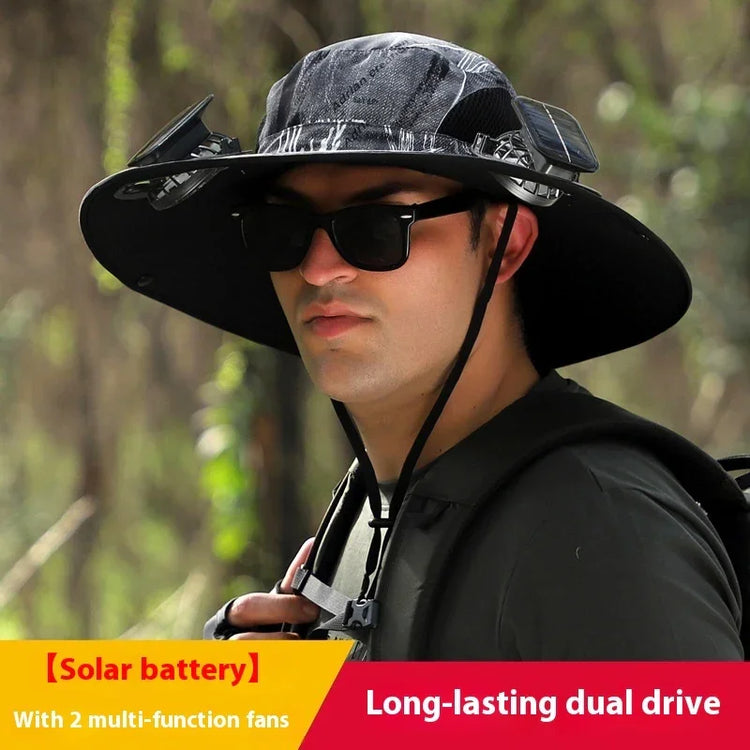 Man wearing a wide-brim black sun hat with solar panels and built-in fans, outdoor streetwear style.