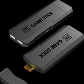 Black 4K game stick with HDMI connector and dual USB ports on a black background