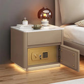 Modern beige nightstand with marble top, built-in safe, and warm ambient lighting.