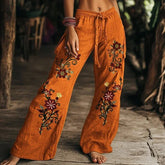Wide leg orange linen pants with floral embroidery, relaxed fit, boho style