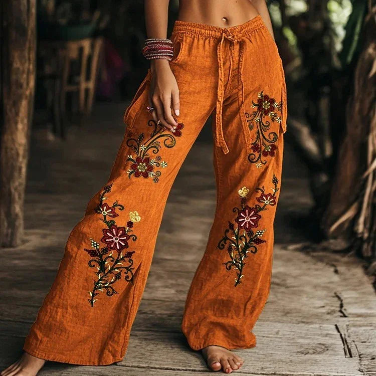 Wide leg orange linen pants with floral embroidery, relaxed fit, boho style