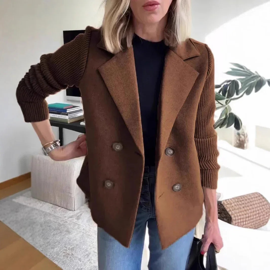 Woman wearing a brown wool double-breasted blazer with ribbed knit sleeves and casual fit