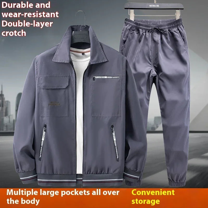 Men's gray utility jacket and jogger pants set with multiple zip pockets, relaxed fit, durable fabric.