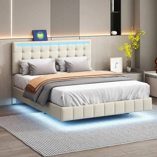 Modern platform bed with tufted cream upholstery, LED lighting, and neutral bedding in stylish bedroom