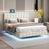 Modern platform bed with tufted cream upholstery, LED lighting, and neutral bedding in stylish bedroom