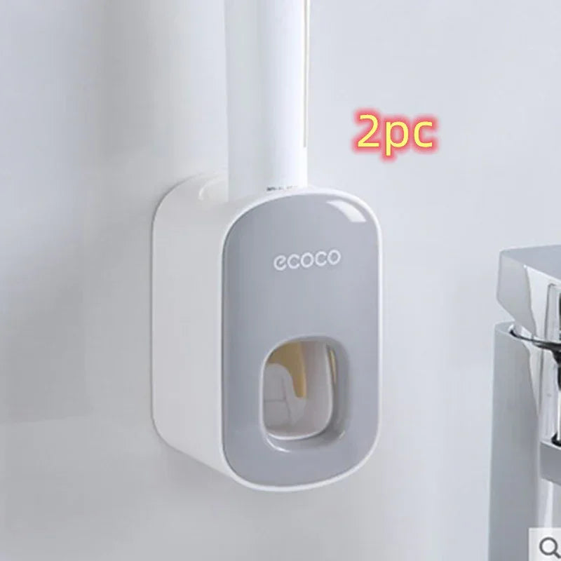 Wall-mounted gray and white plastic dispenser with modern design, suitable for liquids