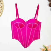 Hot pink structured corset top with adjustable straps, bold seams, and fitted design