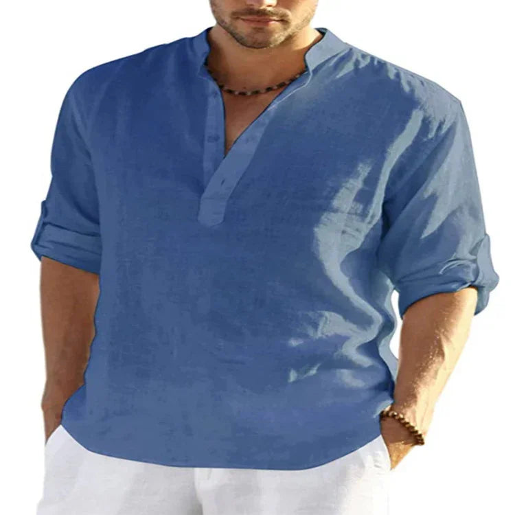 Men's light blue linen long sleeve henley shirt with relaxed fit and rolled sleeves