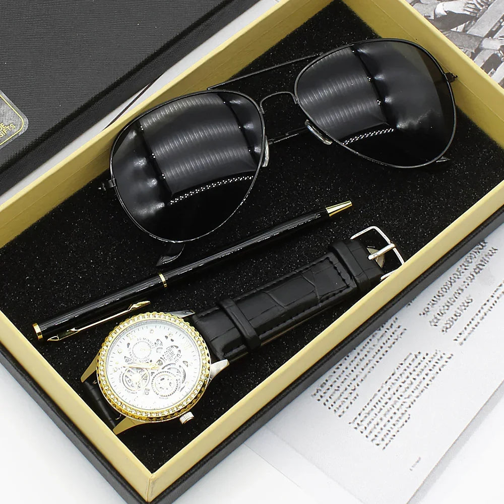 Luxury gift set with black aviator sunglasses, black leather strap watch, and black pen