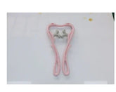 Pink and gray plastic fitness tool on white background, ergonomic and lightweight design