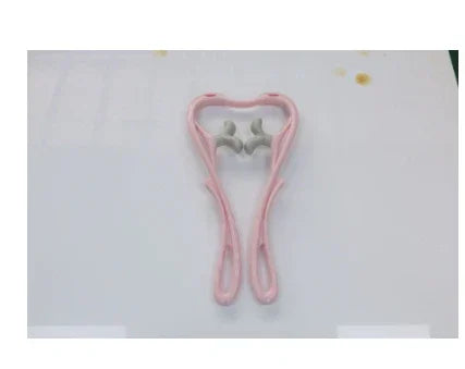 Pink and gray plastic fitness tool on white background, ergonomic and lightweight design