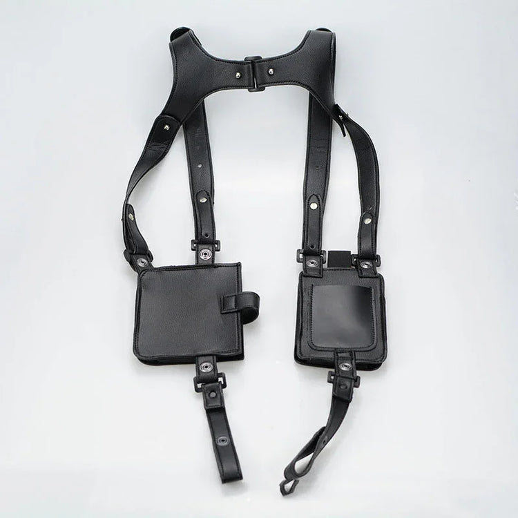 Black faux leather utility harness with adjustable straps and two square pockets, streetwear style