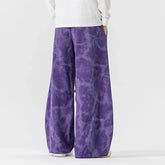 Purple tie-dye wide-leg velvet pants with relaxed fit, casual streetwear style
