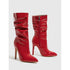 Red patent leather heeled boots with pointed toe and slouchy mid-calf fit
