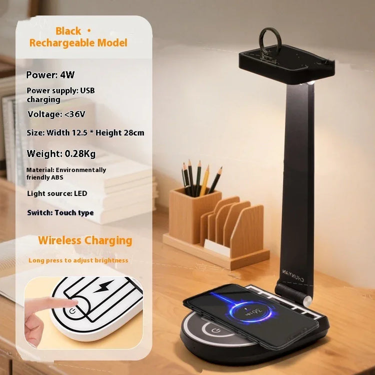 Black LED desk lamp with wireless charging base and touch controls on a wooden desk