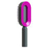 Modern rectangular hair brush with bright purple frame and black bristles, plastic handle