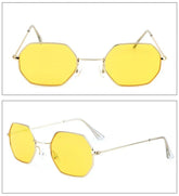 Geometric yellow lens sunglasses with thin gold metal frame, modern streetwear style.