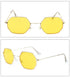 Geometric yellow lens sunglasses with thin gold metal frame, modern streetwear style.