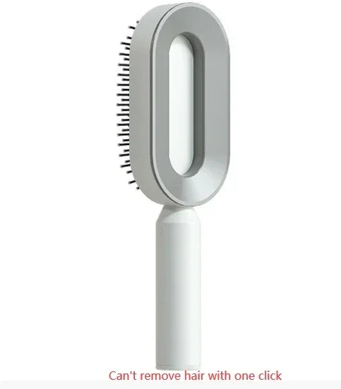 Modern white and gray hairbrush with oval design and ergonomic handle