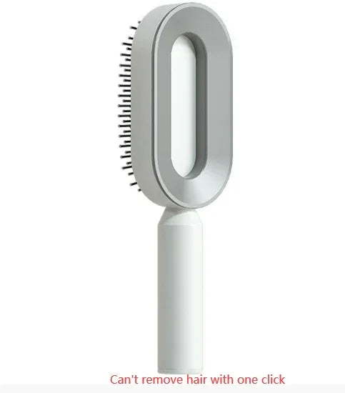 Modern white and gray hairbrush with oval design and ergonomic handle