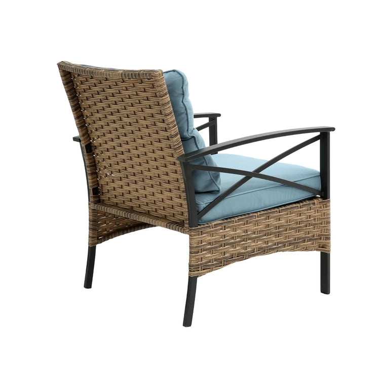 Wicker outdoor chair with light blue cushions, black metal arms, modern patio furniture