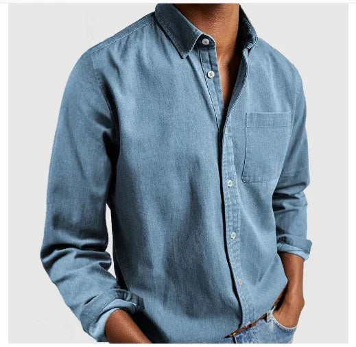 Men's relaxed fit light blue denim shirt with long sleeves and chest pocket